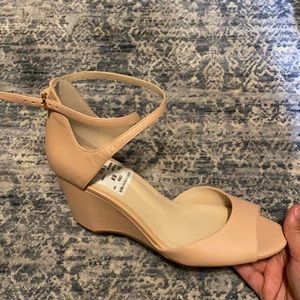 Cole Haan nude/beige wedges.
